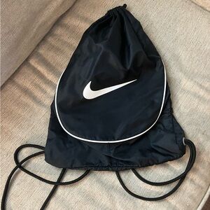 Nike black and white drawstring backpack bag